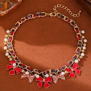 Elegant Red Bow Necklace with Gold Accents and tartan ribbon. NWOT